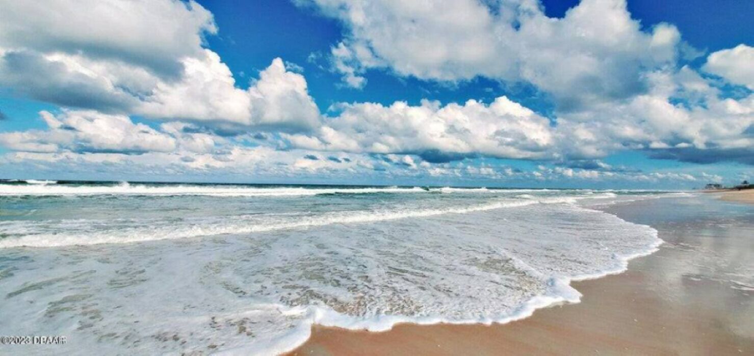 On the beach, sun loungers, beach towels