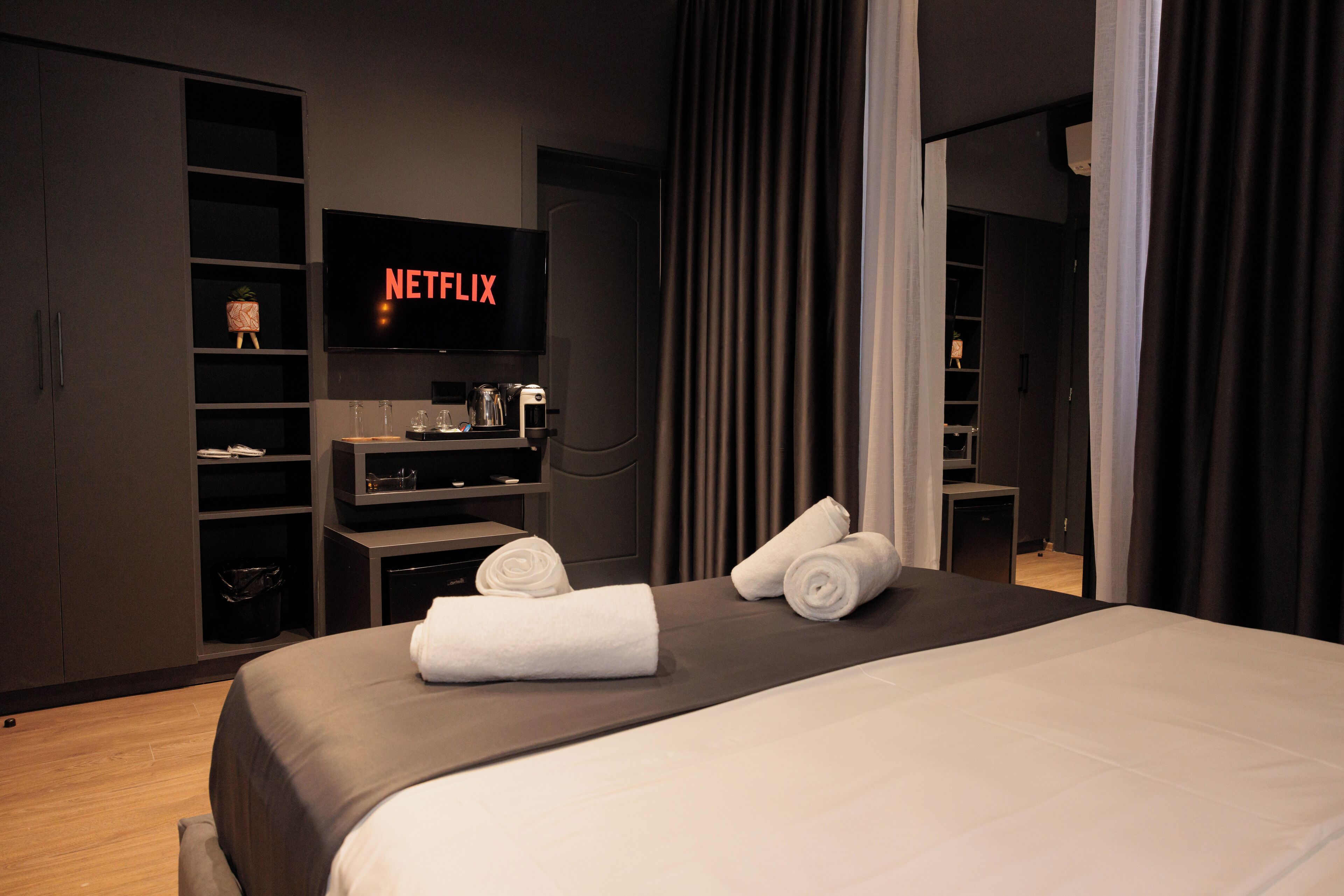 Desk, laptop workspace, blackout drapes, soundproofing