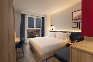 Premium bedding, memory-foam beds, minibar, in-room safe