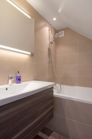 Shower, jetted tub, hair dryer, towels