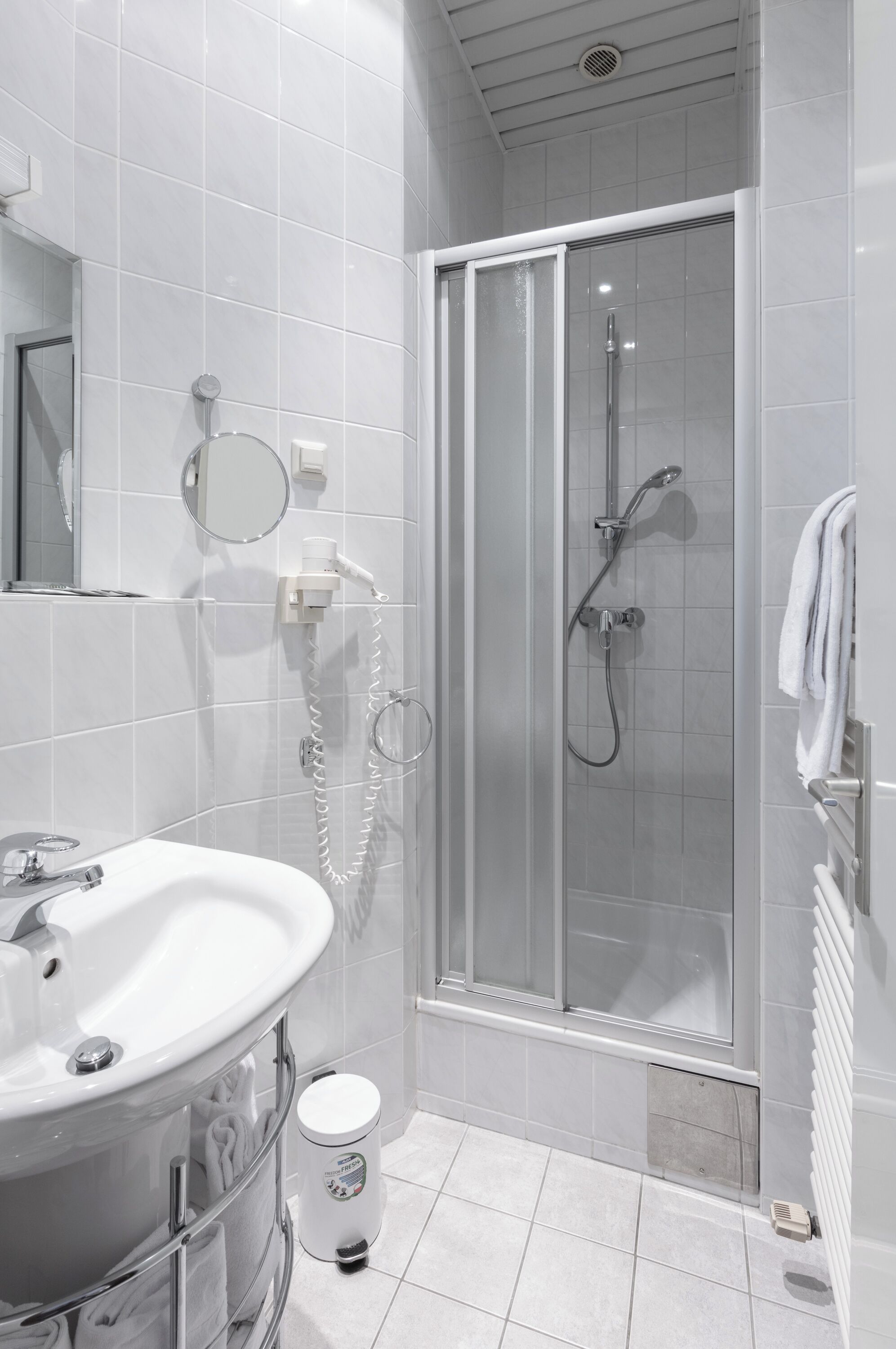 Hair dryer, towels, soap, shampoo
