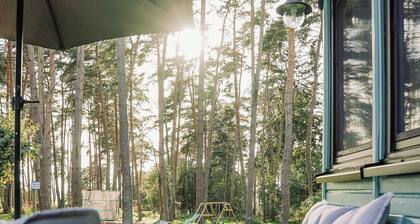 FerienhĂ€user Insel Usedom - Waldhaus 3 - WaldgrundstĂŒck Direkt am Achterwasser!