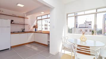 Fridge, microwave, coffee/tea maker, cookware/dishes/utensils
