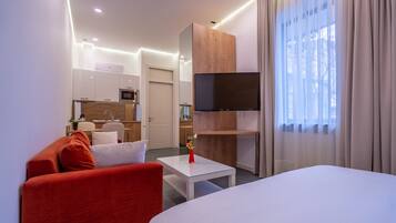 Premium bedding, desk, laptop workspace, soundproofing