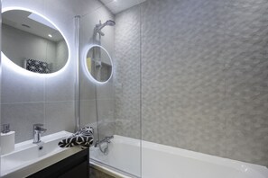 Hair dryer, towels, soap, shampoo