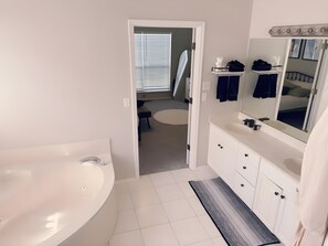 Jetted bath, towels, soap, shampoo