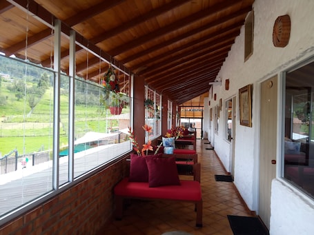 Standard Twin Room | Living area | 100-cm Smart TV with cable channels