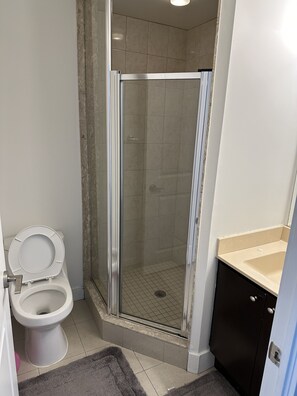 Shower, towels, soap, shampoo