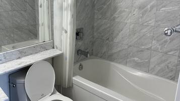 Shower, towels, soap, shampoo