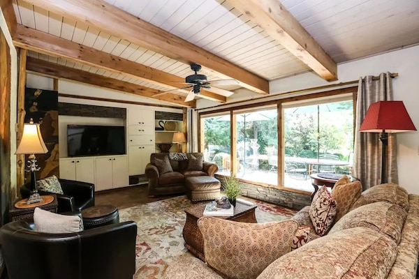 Living room is big enough for everyone and right off the beautiful patio