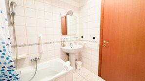 Hair dryer, bidet, towels