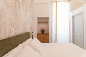 1 habitación, tabla de planchar con plancha, wifi gratis y ropa de cama