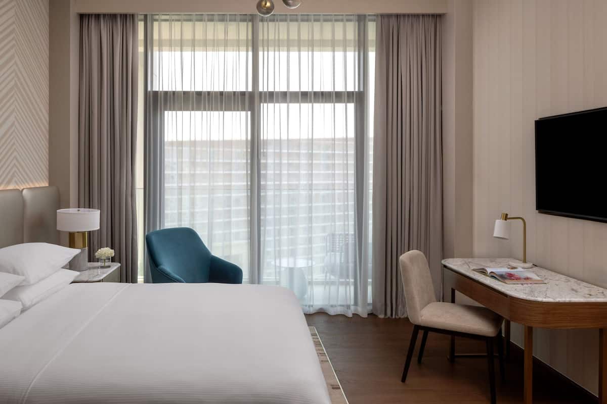 Premium bedding, down duvets, memory-foam beds, in-room safe