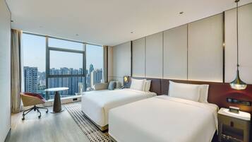 Premium bedding, down duvets, minibar, in-room safe