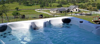Updated mtn-view dog-friendly home with private hot tub, fireplace, firepit, W/D