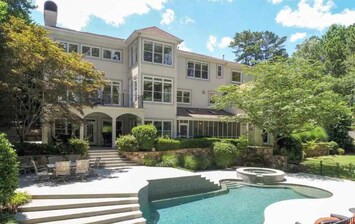 Private, heated salt water pool and spa with lake views.