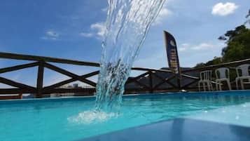 Outdoor pool, open 9:30 AM to 10:00 PM, pool umbrellas, sun loungers