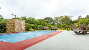 Outdoor pool, open 8:00 AM to 8:00 PM, sun loungers