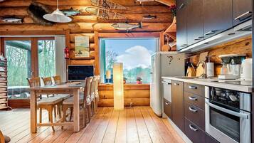 Fridge, stovetop, dishwasher, coffee/tea maker