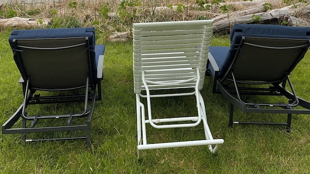 Two lawn chairs facing a beach with waves and mountains in the distance. - Beach Haven (Sekiu)