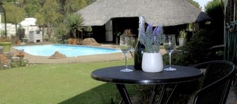 Contemporary Gem: Studio with Serene Pool View
