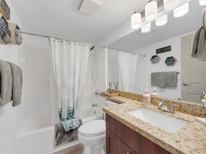 Hair dryer, towels, soap, shampoo