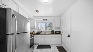 Coffee/tea maker, fridge, microwave, oven -  4-Bed Sanctuary in Vibrant Birmingham (Birmingham)