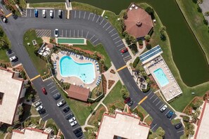 Outdoor pool, a heated pool - First Floor Condo. Steps to the Beach, hot tub and pool (St. Augustine Beach)
