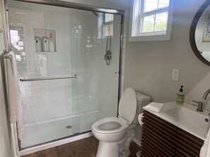 Shower, hair dryer, towels, soap