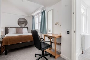 1 slaapkamer, een strijkplank/strijkijzer, wifi, beddengoed