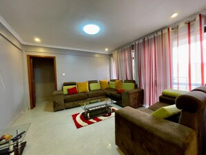 TV, stereo - Charming 2-Bed Apartment in Kigali (Kigali)