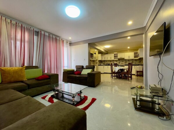 TV, stereo - Charming 2-Bed Apartment in Kigali (Kigali)