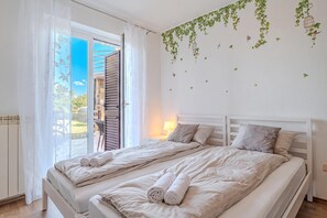 2 slaapkamers, een strijkplank/strijkijzer, gratis wifi, beddengoed