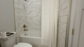 Hair dryer, towels, soap, shampoo