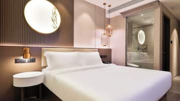 Cubrecamas, minibar con artículos gratuitos, wifi gratis y ropa de cama