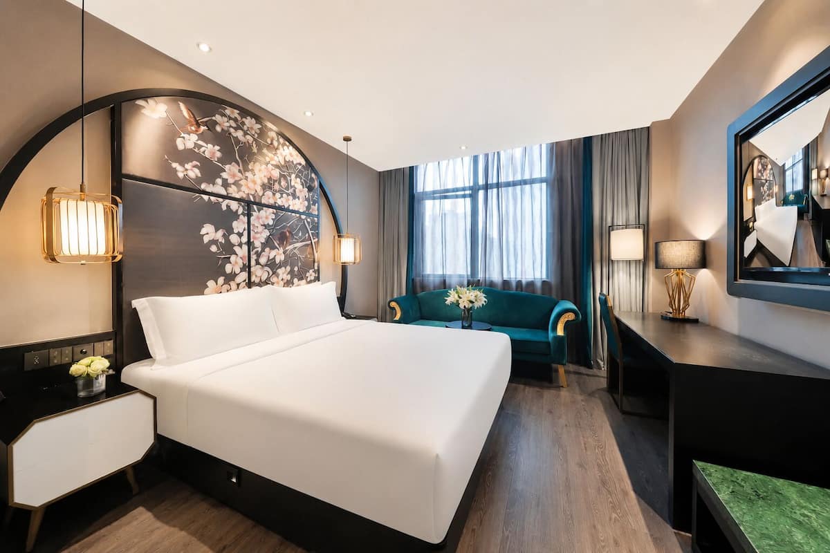 Business Double Room Single Use | Living area | 55-inch TV with digital channels
