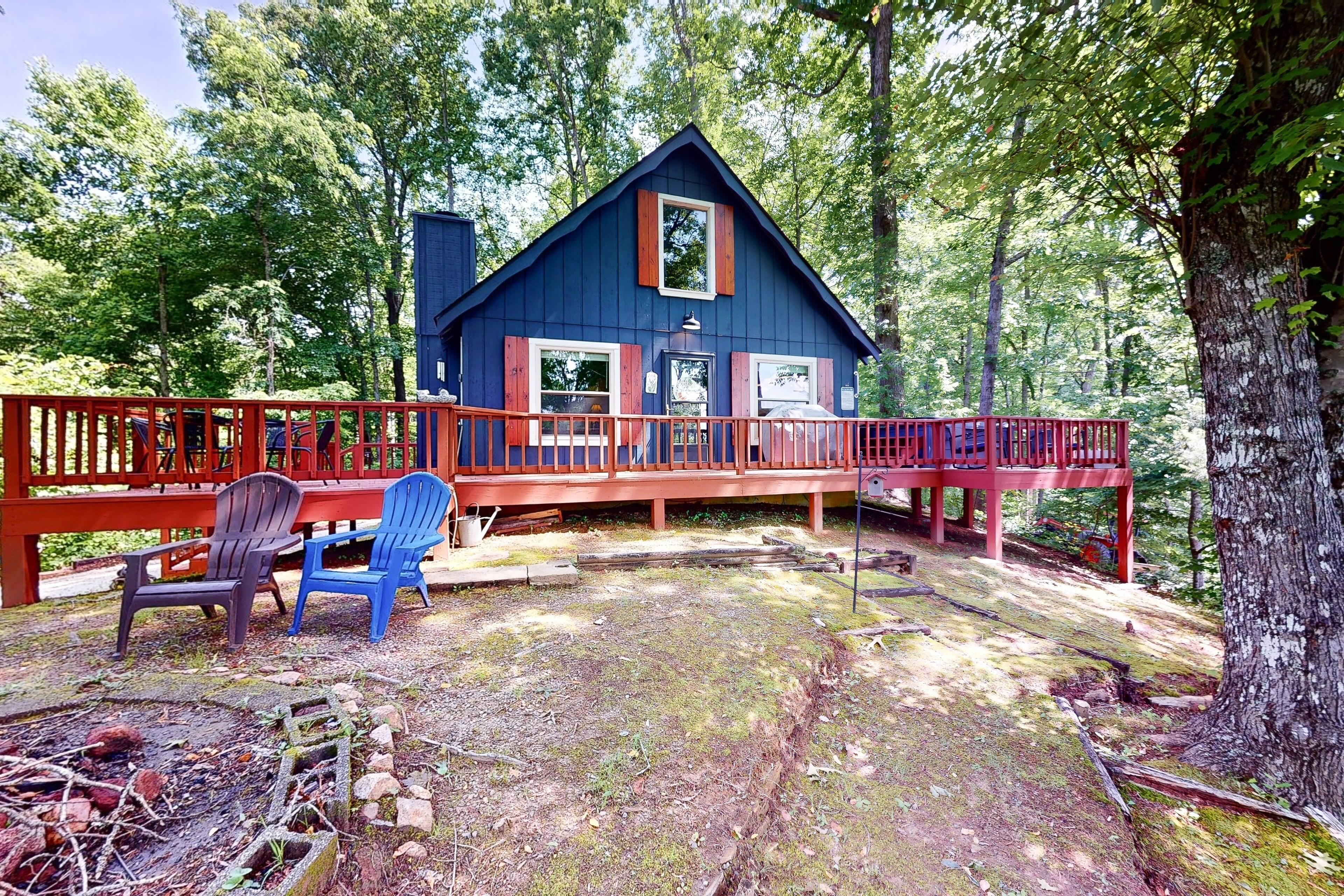 Dog-friendly mtn-view cabin with private hot tub, fireplace, firepit, game table