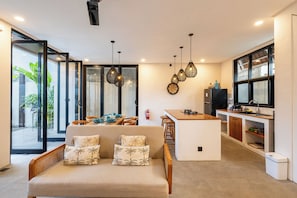 Villa | Living room | 20-inch flat-screen TV with satellite channels