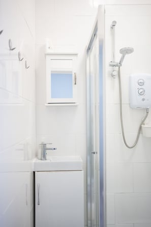 Shower, towels, soap, shampoo