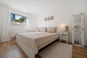 2 dormitorios, tabla de planchar con plancha, wifi gratis y ropa de cama