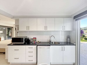 Fridge, microwave, coffee/tea maker, toaster