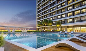 Relax by the rectangular pool surrounded by lounge chairs and take in the views from the hotel's contemporary design.