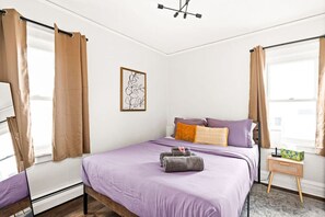 1 bedroom, desk, iron/ironing board, travel crib