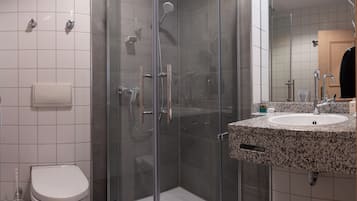 Shower, free toiletries, hair dryer, towels