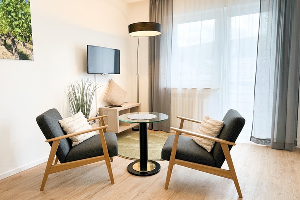 Comfort Studio | Living area | 32-inch LCD TV with cable channels