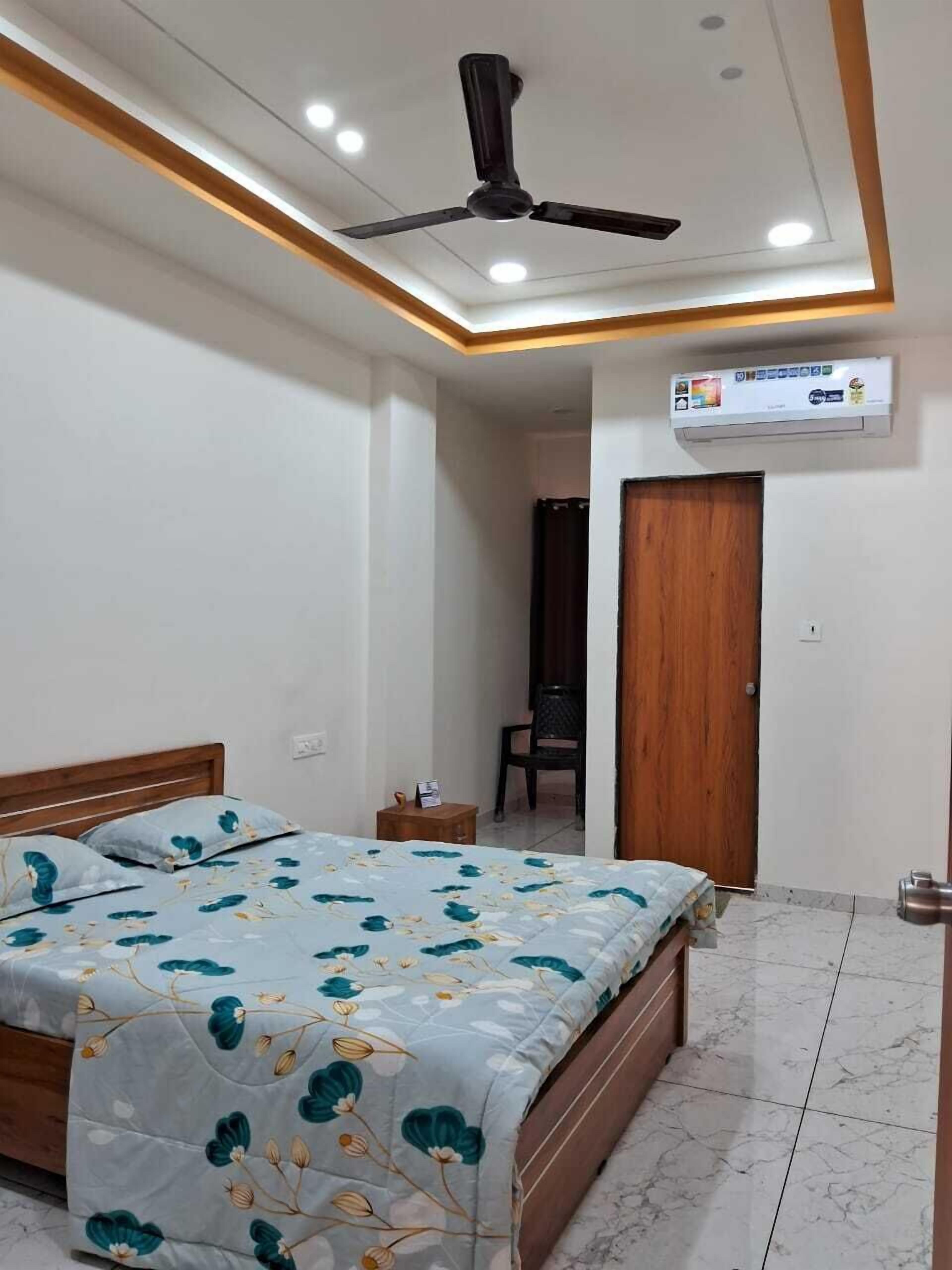 Habitación familiar doble | Edredones de plumas y colchones Select Comfort