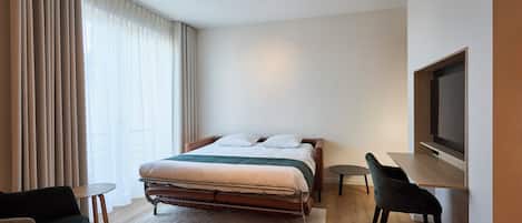 Superior Apartment | Living area | 43-inch Smart TV with cable channels, Netflix, streaming services