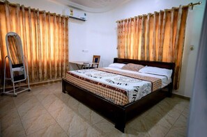 Standard Single Room, 1 Double Bed | Individually decorated, individually furnished, desk, laptop workspace - Crislord Palace Hotel (Sekondi-Takoradi)