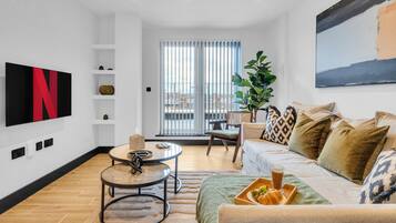 Executive Apartment | Living area | 20-inch Smart TV with digital channels