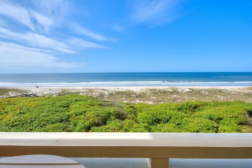 Oceanfront Caswell Beach OIBV 406, a cozy 2-bedroom condo for up to 5 guests.